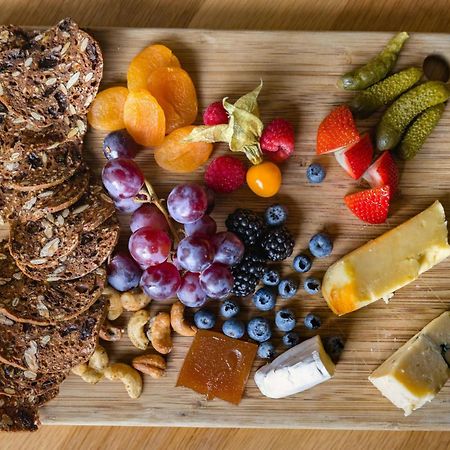 The Westin Resort & Spa, Whistler Exterior photo A cheese board with fruit and crackers